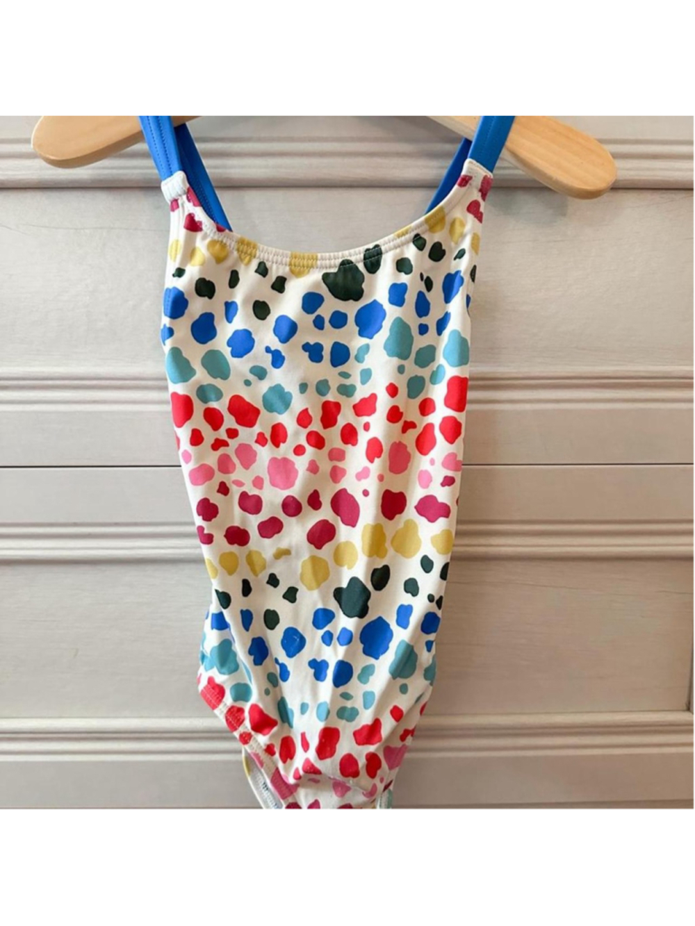 Boden multicolored polka dot swimsuit with blue, red, yellow, and green spots
Si